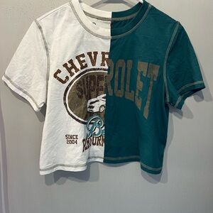 Chevrolet graphic cropped t-shirt featuring a split-tone design. Size S